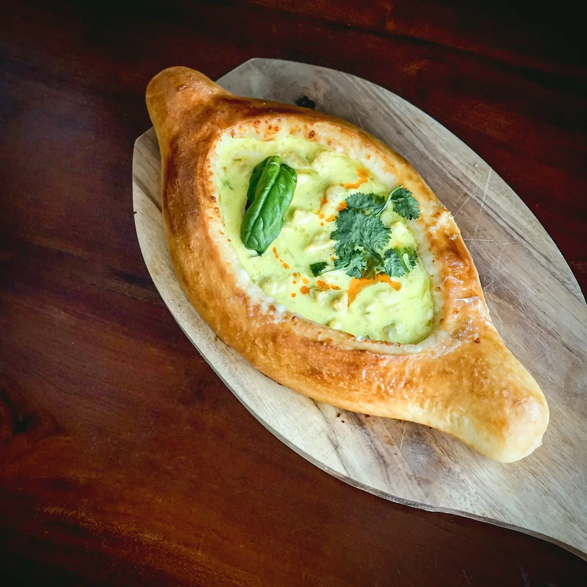 Khachapuri with chicken in cream at Tarragon Georgian restaurant, Uluwatu Bali