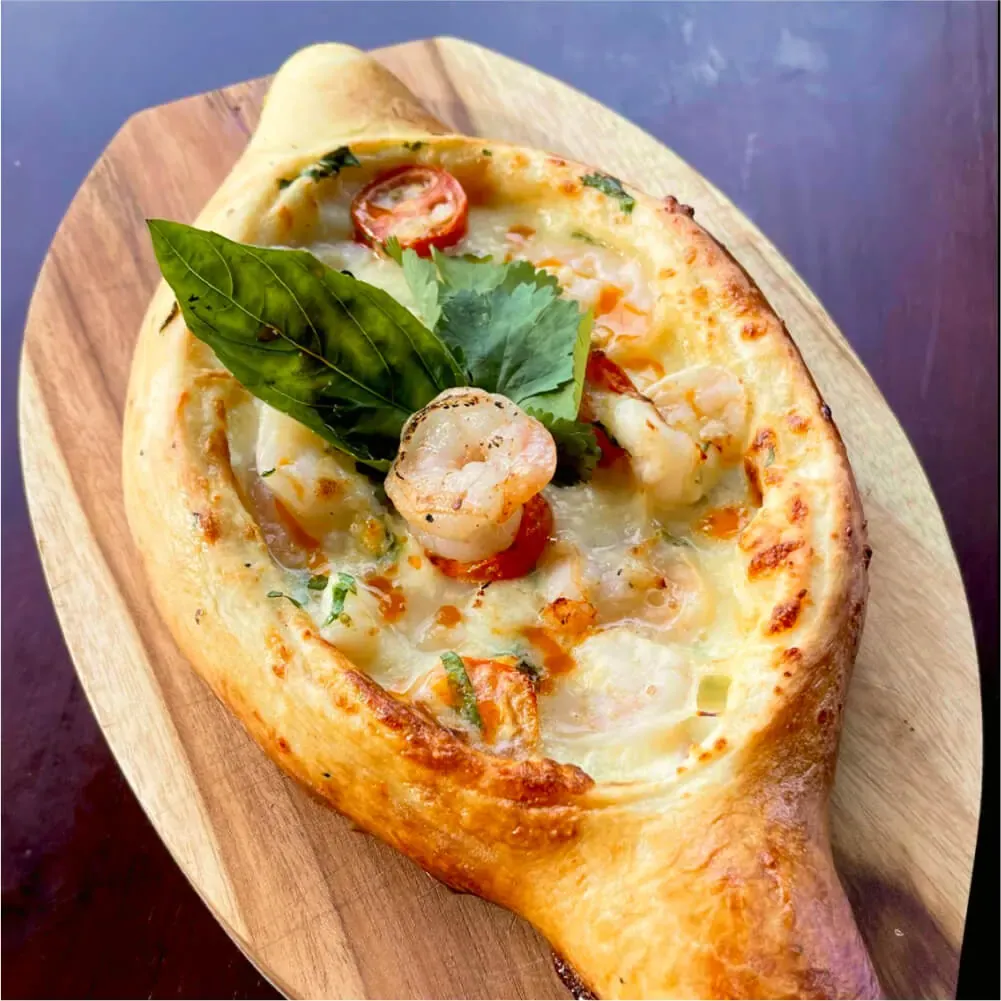 Khachapuri with shrimp & tom yum at Tarragon Georgian restaurant, Uluwatu Bali